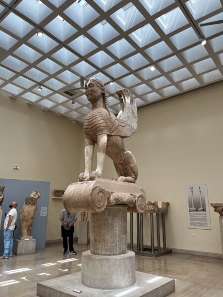 a picture of a sphynx statue in Delphi Museum