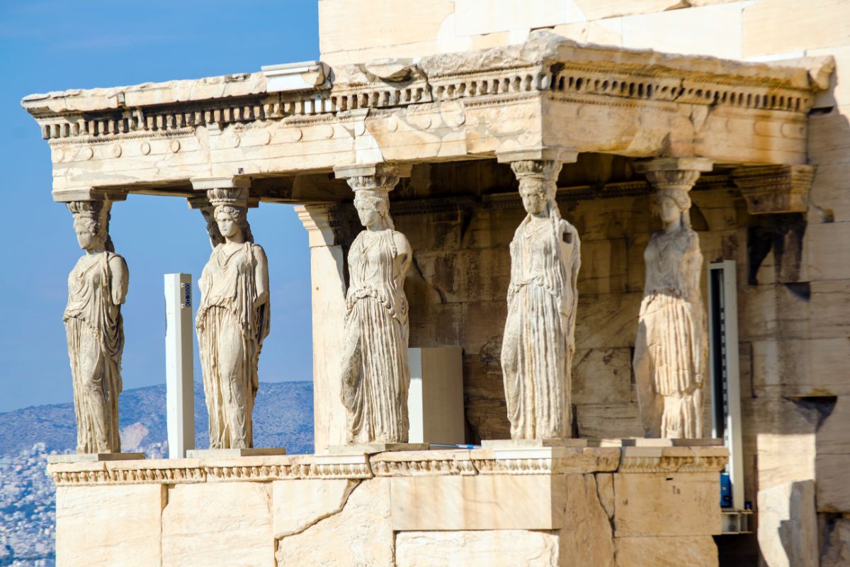 The Caryatides of the Erechtheion on the Acropolis in Athens, showcasing the statues of women used as architectural supports.