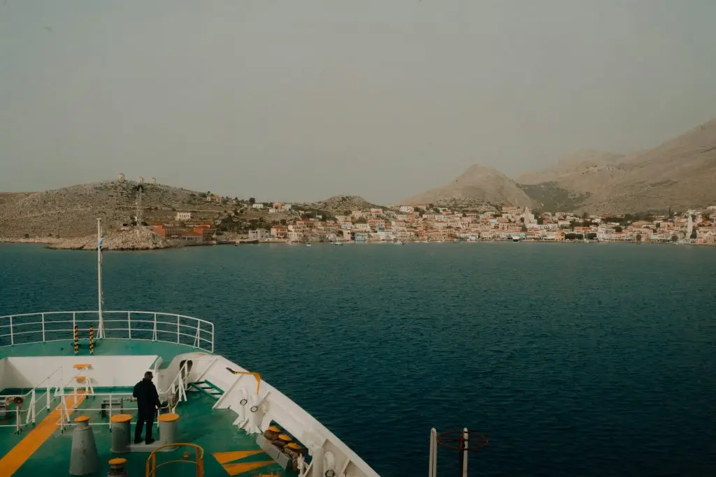 Traveller on a ferry deck in the Greek islands